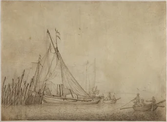 Navires à un barrage de pêche avec une ville en arrière-plan