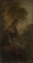 Jeune femme sous un arbre au coucher du soleil