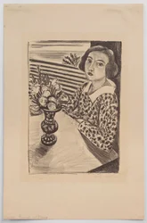 Jeune fille assise avec un bouquet de fleurs