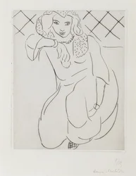 Femme orientale voilée agenouillée