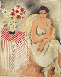 Femme sur une chaise - Fleurs sur la table, ou œillets