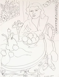 Jeune femme à table