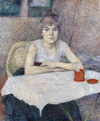 Jeune femme à une table
