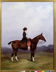 Dame montant en amazone