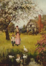 Mère et enfant regardant les canards