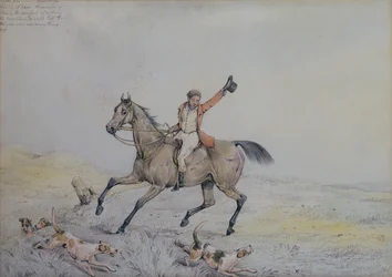 Un chasseur encourageant des chiens