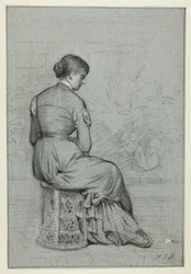 Femme assise sur un tabouret