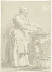 Femme nettoyant du poisson
