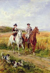 Couple à cheval avec leurs chiens