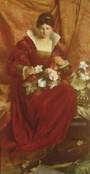 Une dame arrangeant des fleurs