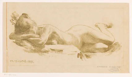 Femme nue allongée sur le ventre