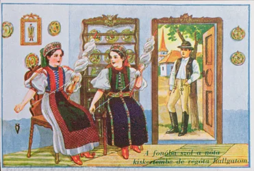 Carte postale représentant des femmes en costume traditionnel hongrois filant et chantant la chanson populaire Chante une chanson à la grenouille, vers 1940
