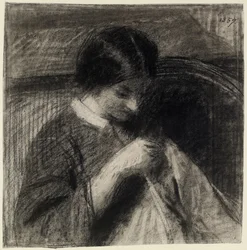 Femme cousant