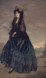 Femme avec mantille, fleurs et éventail