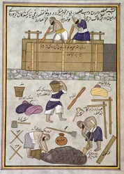 Un constructeur de murs en terre