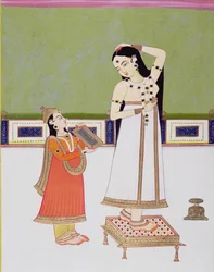 Dame indienne à sa toilette se regardant dans un miroir