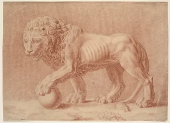 Lion tourné vers la gauche avec sa patte gauche sur un globe