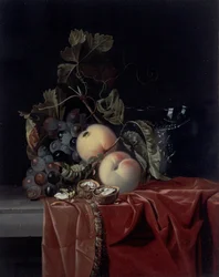 Nature morte de raisins, pêches, noix et un verre de vin