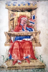 Un homme juif écrivant sur une chaise