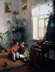 Enfants feuilletant un livre d