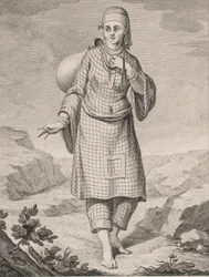 Une femme arabe puisant de l