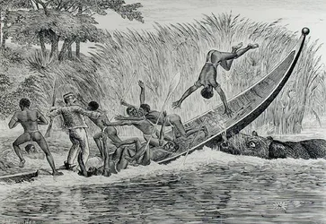 Hippopotame enragé renversant un bateau