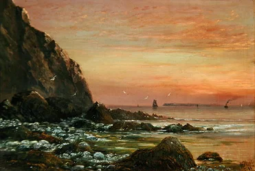 Paysage marin avec falaise au coucher du soleil