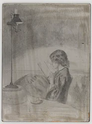 Lecture à la lumière de la lampe