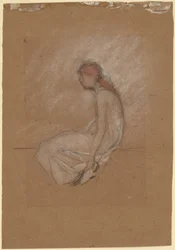Femme assise aux cheveux roux