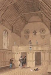 Salle à poutres avec des personnages en costume du XVIe siècle