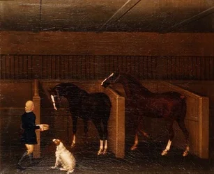 Un palefrenier, des chevaux et un chien dans une écurie