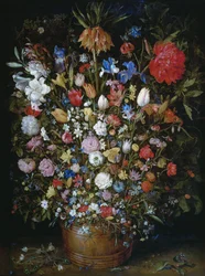 Fleurs dans un vase en bois