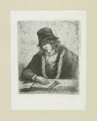 Homme lisant avec un chapeau