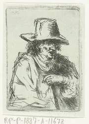 Homme avec un haut-de-forme et une canne