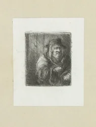 Vieil homme avec manteau et chapeau