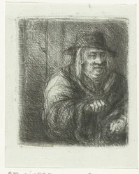 Vieil homme avec manteau et chapeau