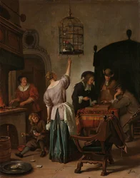 Intérieur avec une femme nourrissant un perroquet, connu sous le nom de 