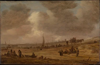 Une plage avec des bateaux de pêche