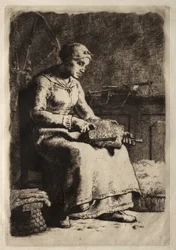 Femme cardant la laine