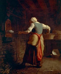 Femme cuisant le pain