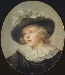 Portrait de jeune garçon avec un chapeau à plumes