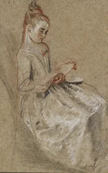 Fille assise avec un livre de musique sur ses genoux