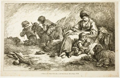 Mère et enfants avec moutons