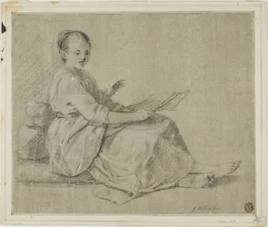 Femme pieds nus assise sur le sol