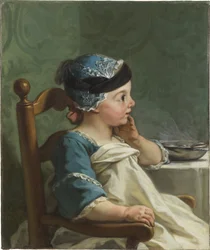 Garçon dans une chaise haute