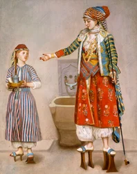 Une femme en costume turc dans un hamam instruisant sa servante