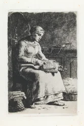 Femme cardant la laine