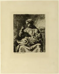 Femme nourrissant son enfant