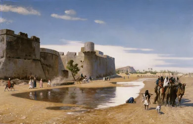 Une caravane arabe devant une ville fortifiée, vers 1895