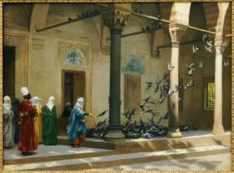 Femmes du harem nourrissant des pigeons dans une cour